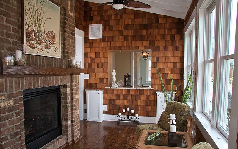 Real Developments Custom Home Sunroom with fireplace in East Beach Norfolk Virginia800x500